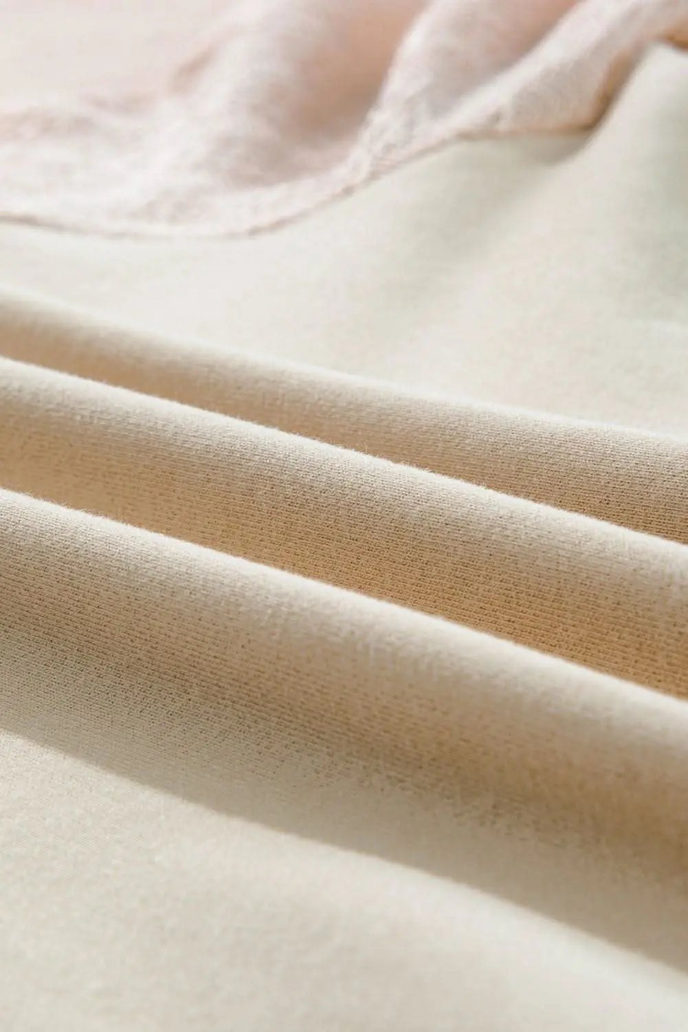 Chic knit patchwork pullover in parchment - Love Salve